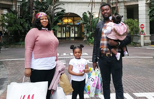 The Onwa family at  Canal Walk Shopping Center.